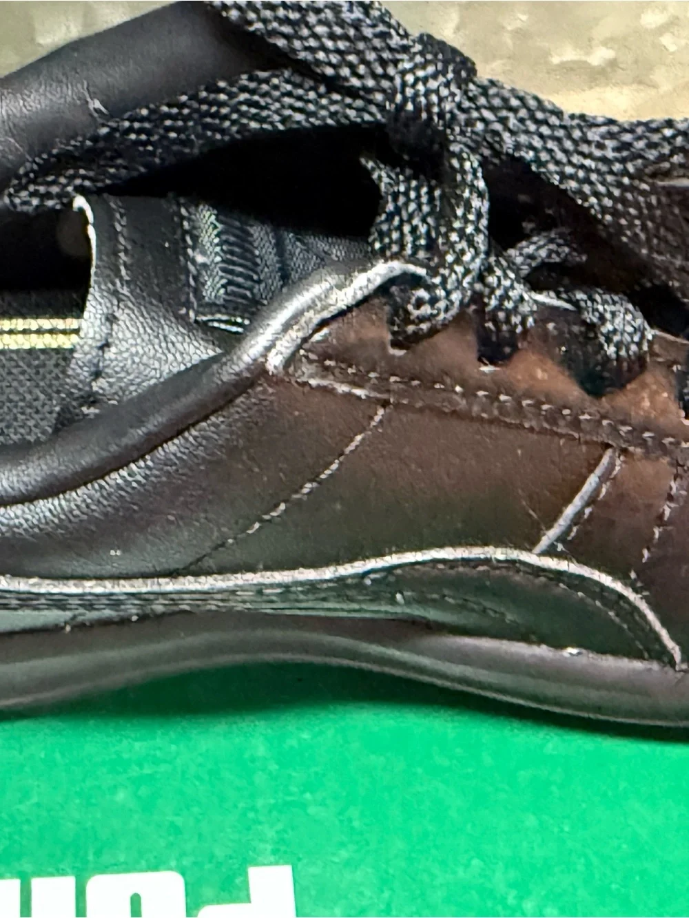 Puma Kids Black Low-Top Lace Sneakers with Gold Logo